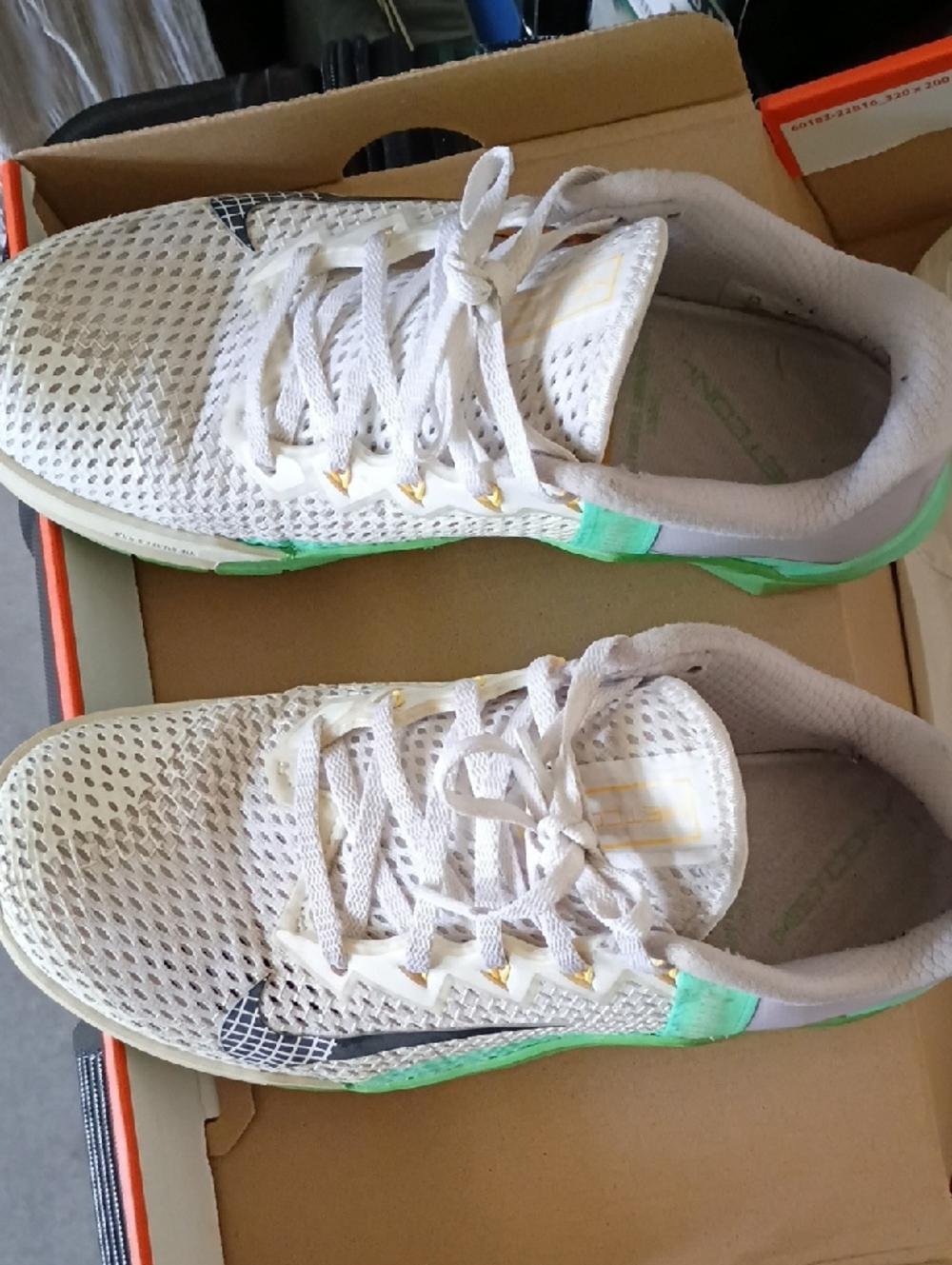 Nike White Mesh Trainers with Mint Green Accents